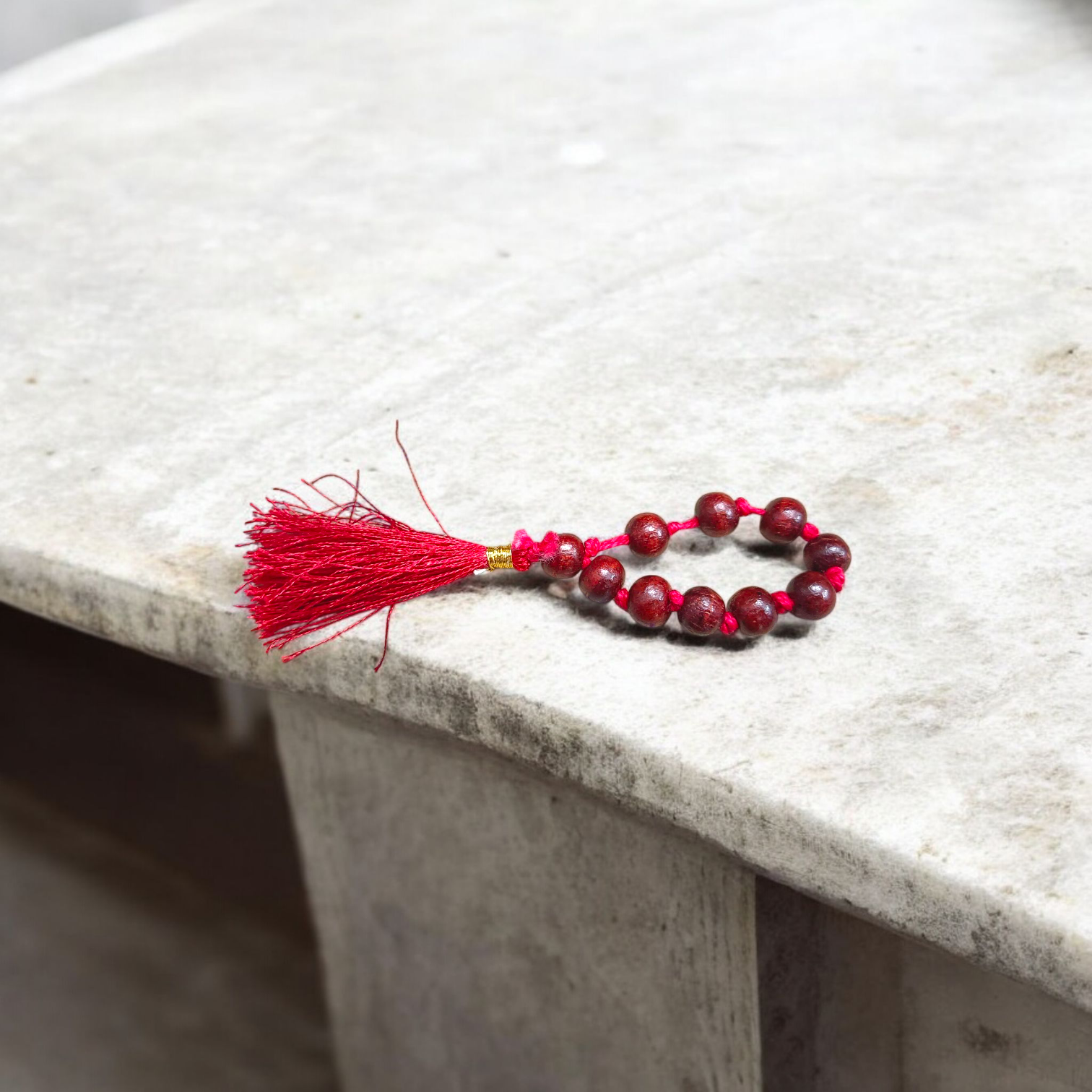 Natural Red Sandalwood Finger Mala featuring 9+1 smooth 8mm Lal Chandan beads, lab-certified mala used for meditation, prayer, and spiritual purity