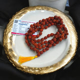 Natural Rudraksha Mala with 5 Mukhi beads, available in different variants for Jaap, meditation, and wearing, lab-certified for authenticity.
