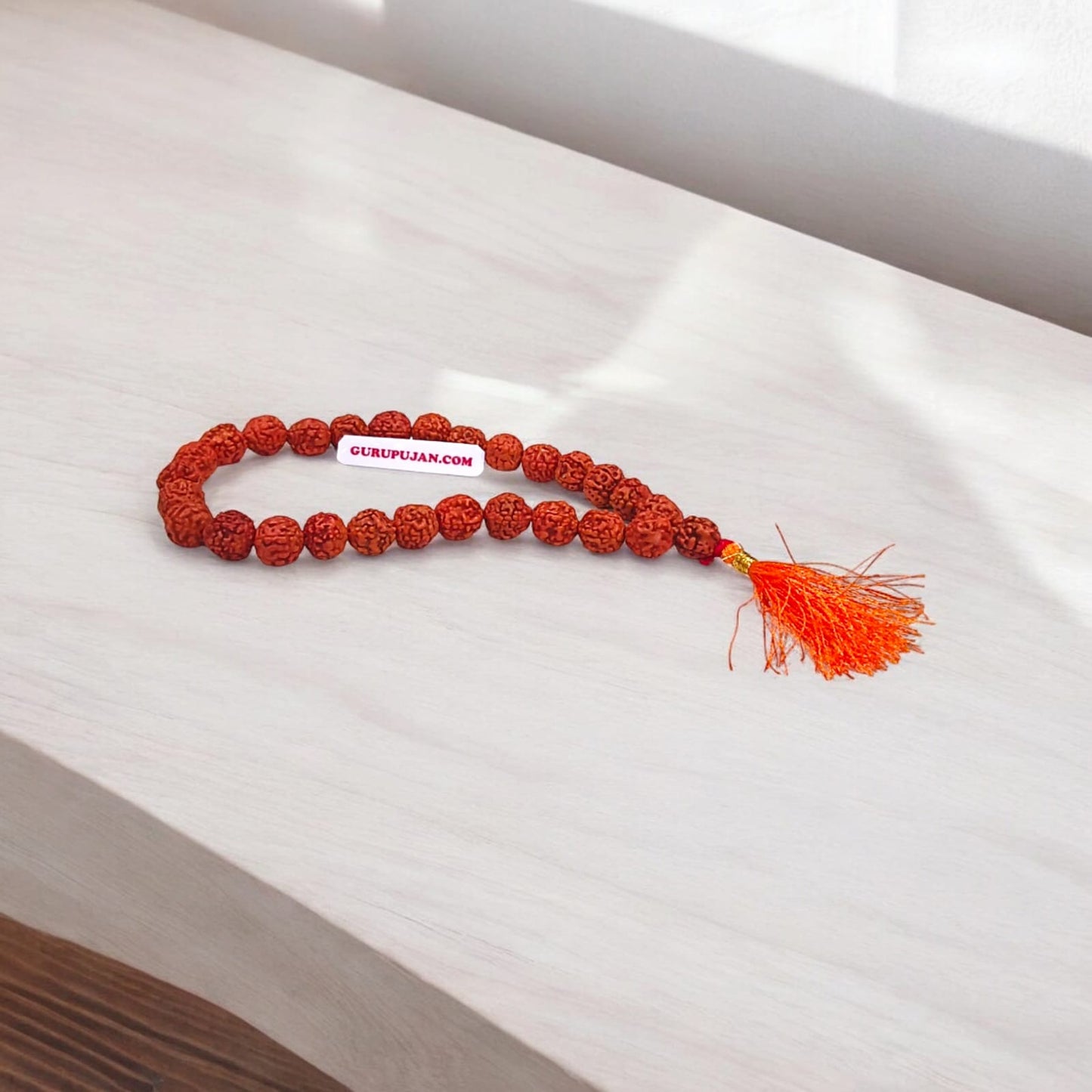 Natural Rudraksha Mala with 5 Mukhi beads, available in different variants for Jaap, meditation, and wearing, lab-certified for authenticity.