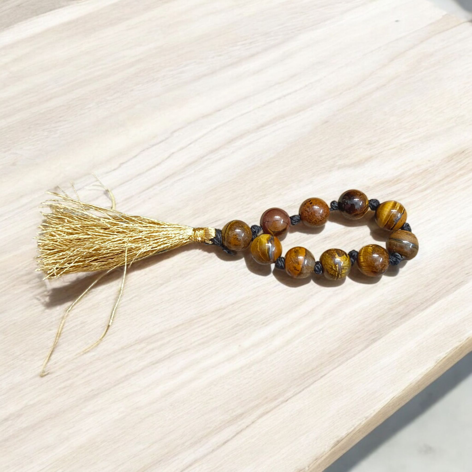 Natural Tiger Eye Finger Mala with 9+1 smooth 8mm golden-brown beads, lab-certified gemstone mala used for meditation, healing, and protection