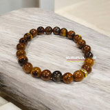 Natural Tiger's Eye Bracelet made from 8MM beads with a stretchable band, Lab Certified for authenticity.