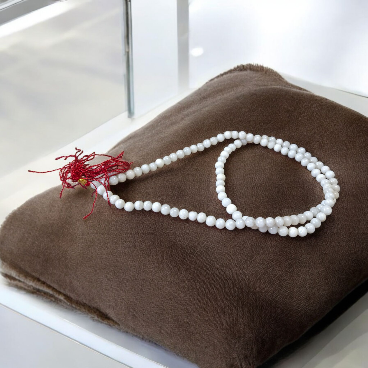 Natural white agate (safed hakik) mala with 108+1 beads, 6mm size, used for healing, meditation, and spiritual protection