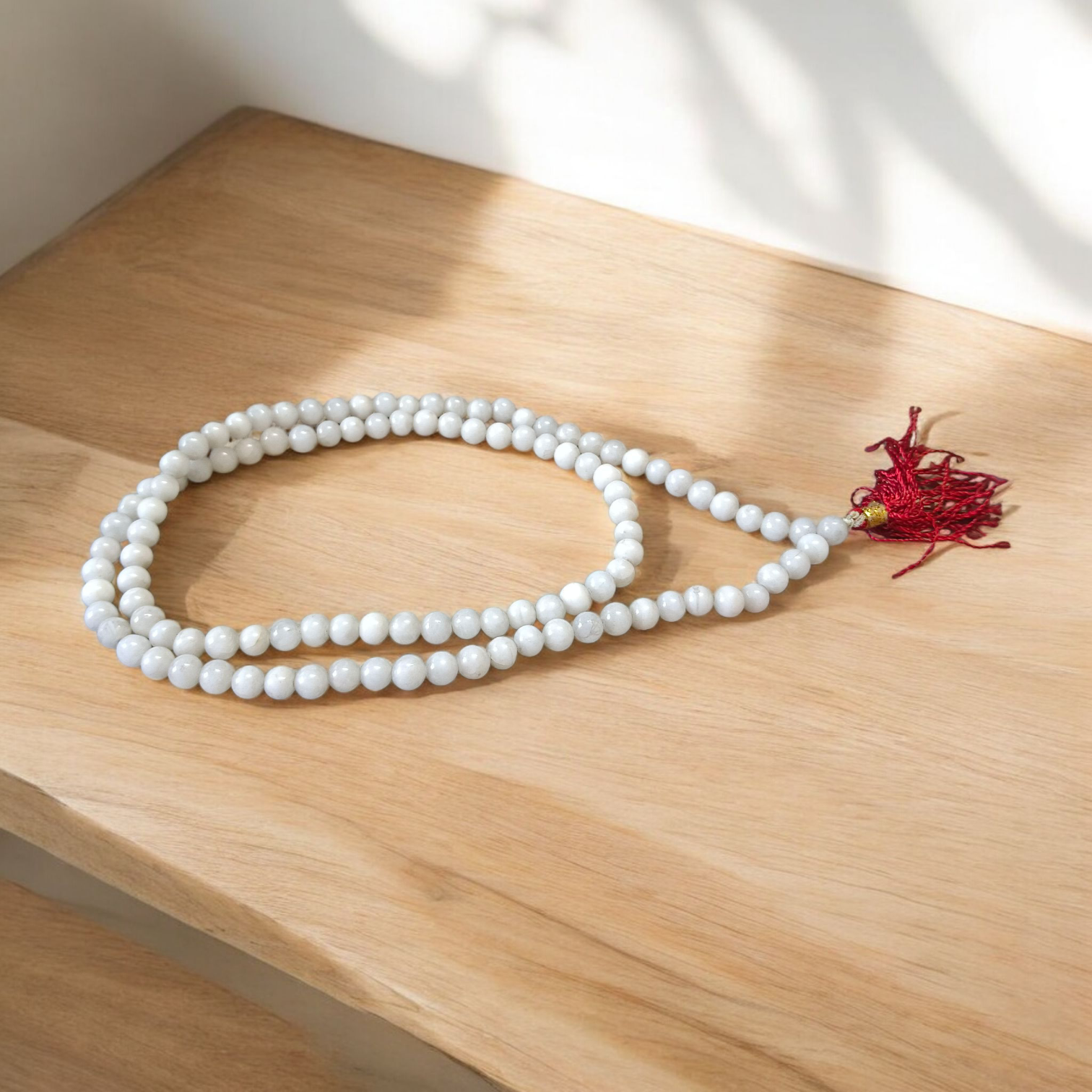 Natural white agate (safed hakik) mala with 108+1 beads, 6mm size, used for healing, meditation, and spiritual protection