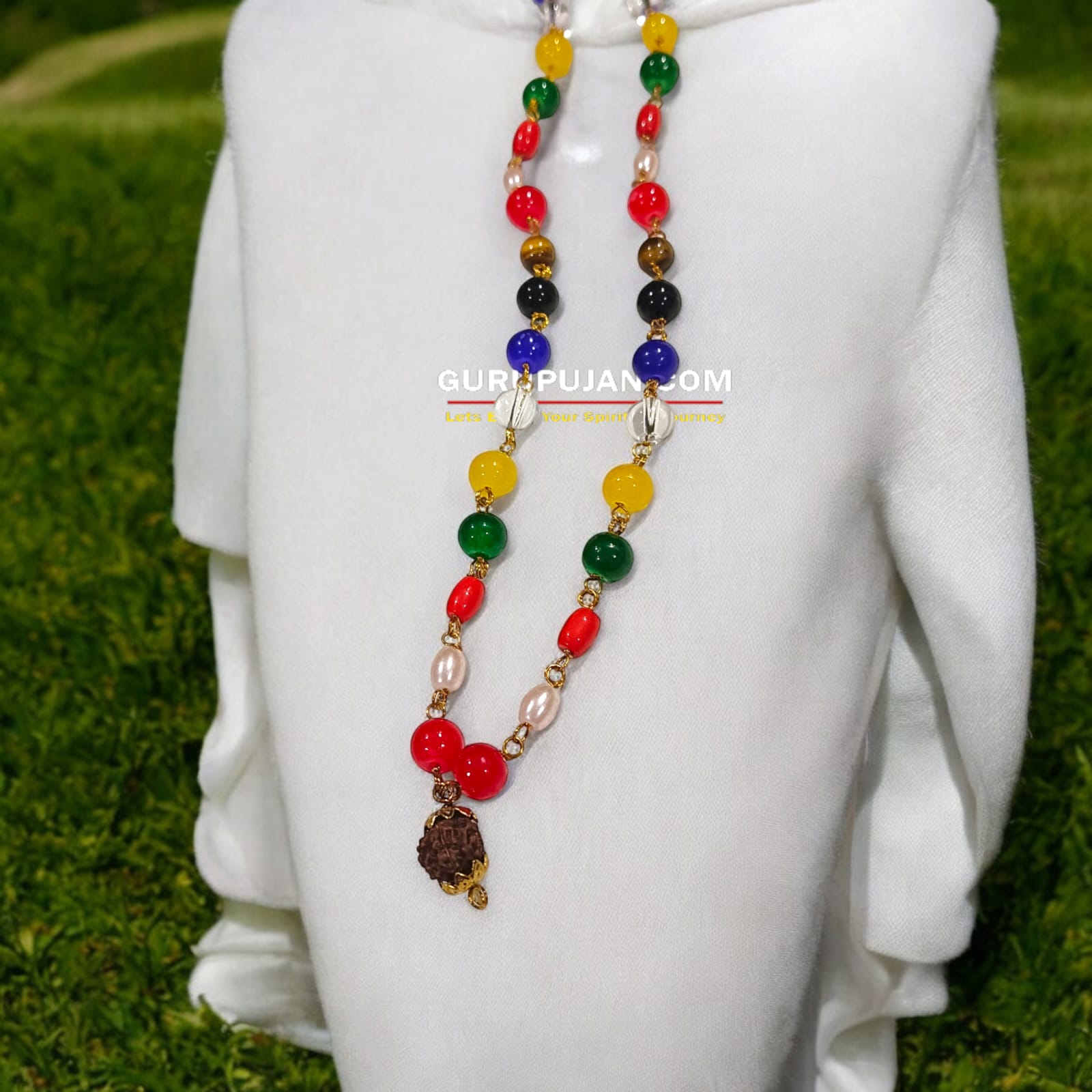Navratan Mala made with 9 natural gemstones, featuring Rudraksha closure, ideal for planetary balance and prosperity.