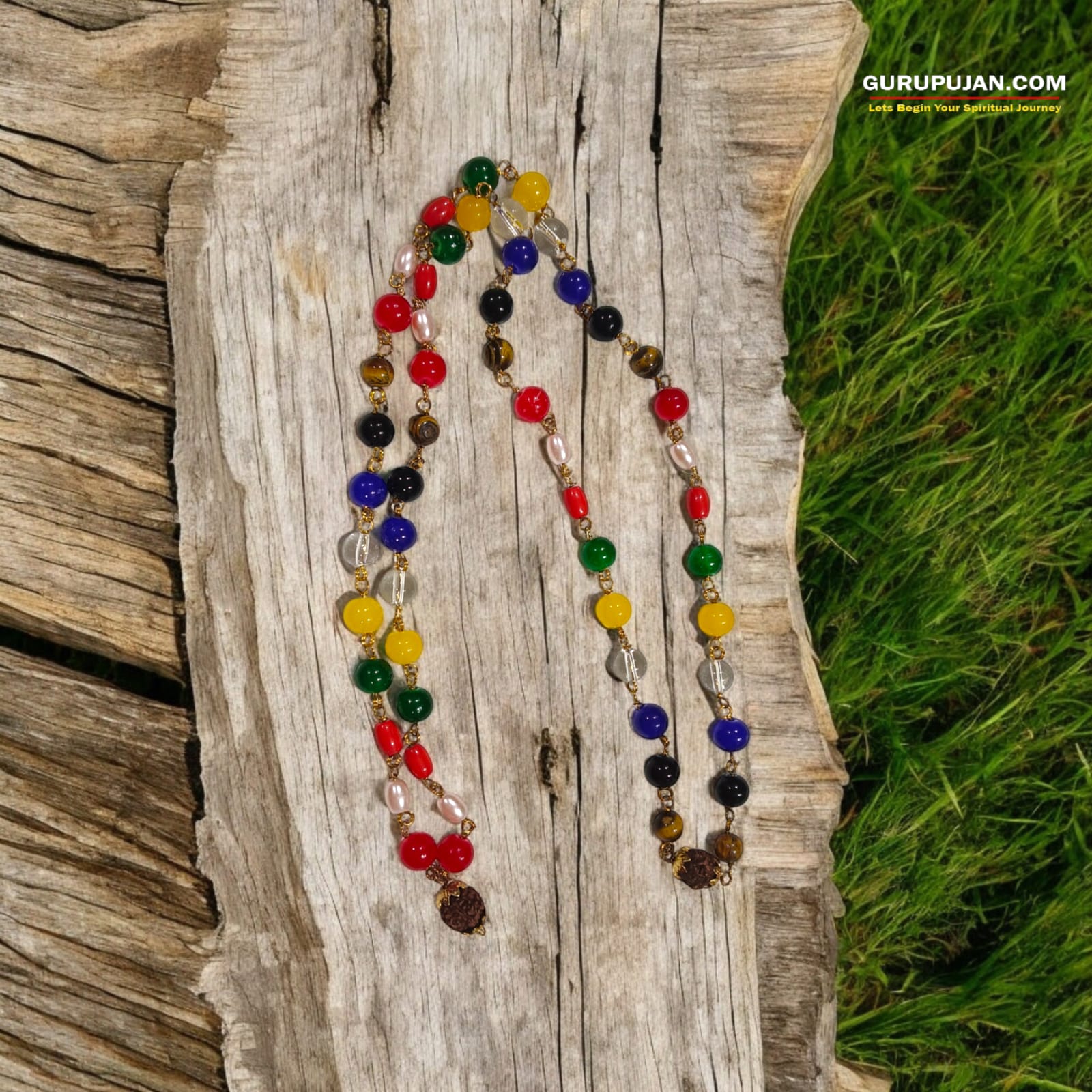 Navratan Mala made with 9 natural gemstones, featuring Rudraksha closure, ideal for planetary balance and prosperity.