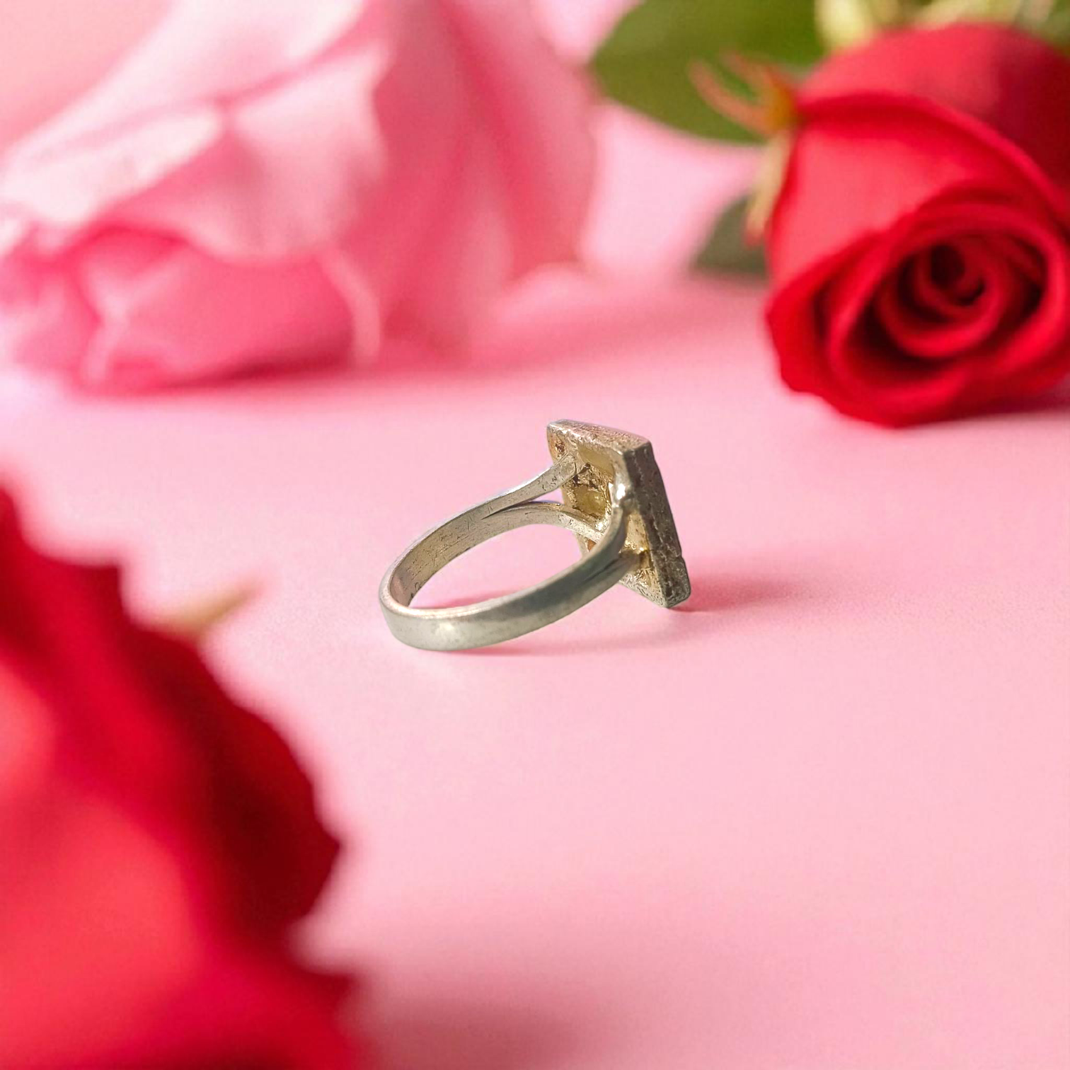 Navratan Ring Square Shape – Spiritual and astrological ring featuring nine gemstones for prosperity, health, and protection.