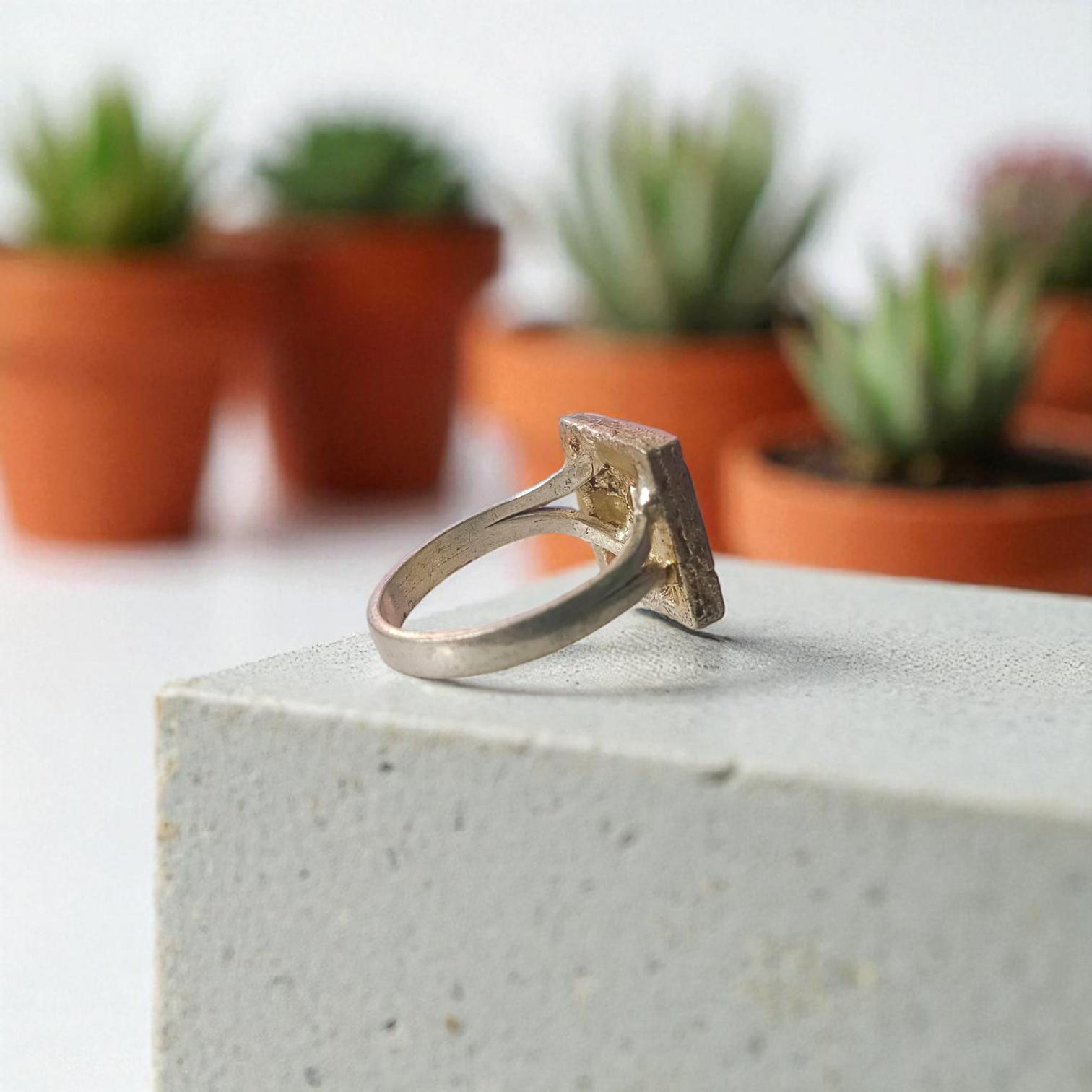 Navratan Ring Square Shape – Spiritual and astrological ring featuring nine gemstones for prosperity, health, and protection.