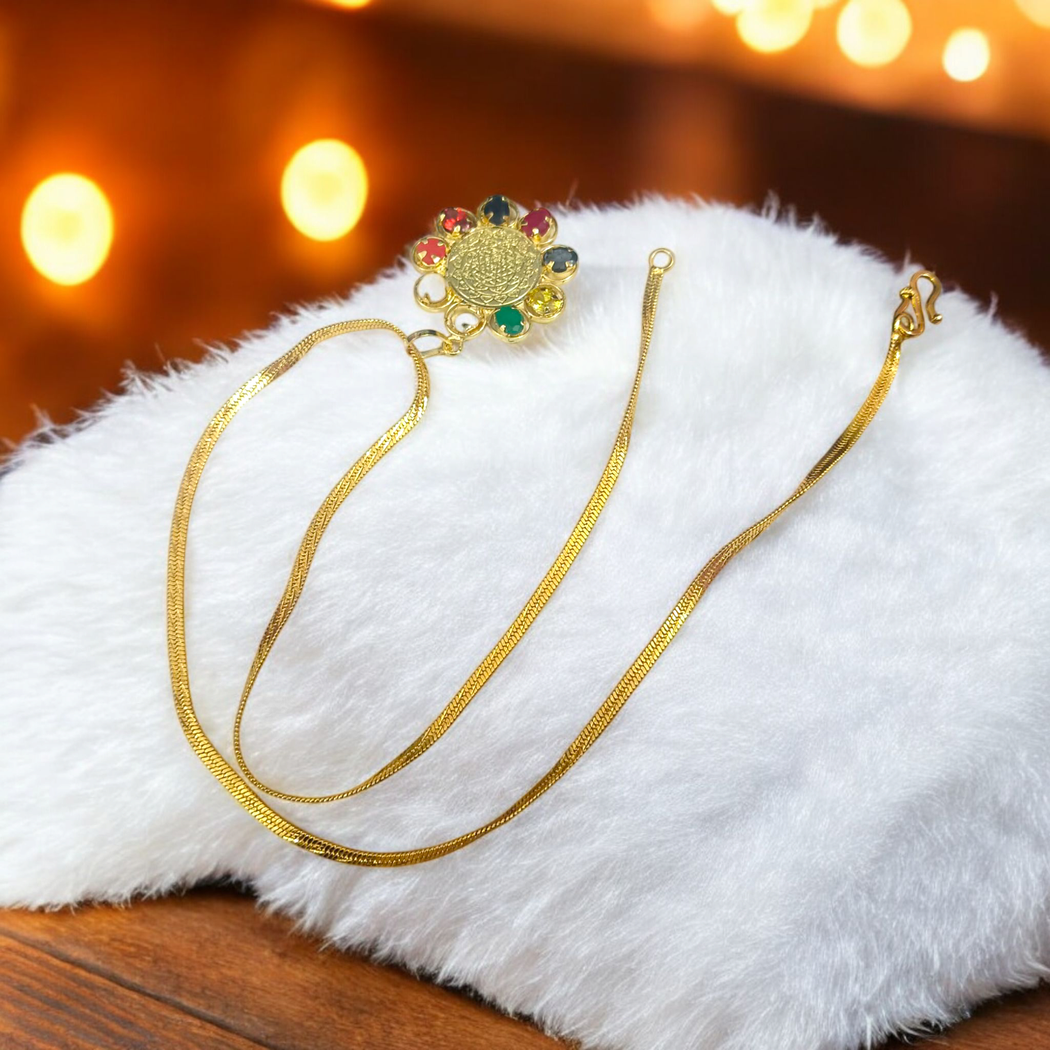 Navratna Locket with Shri Yantra – Nine gemstones pendant with sacred Shri Yantra symbol, gold-plated chain, offering spiritual protection, prosperity, and divine blessings.