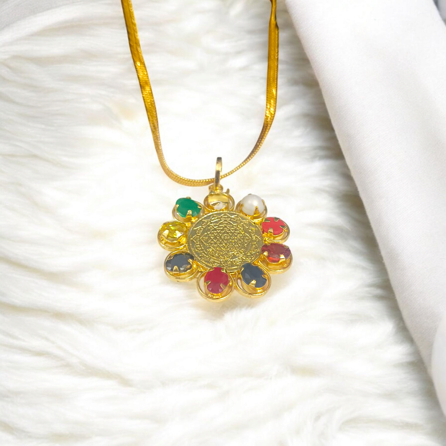 Navratna Locket with Shri Yantra – Nine gemstones pendant with sacred Shri Yantra symbol, gold-plated chain, offering spiritual protection, prosperity, and divine blessings.