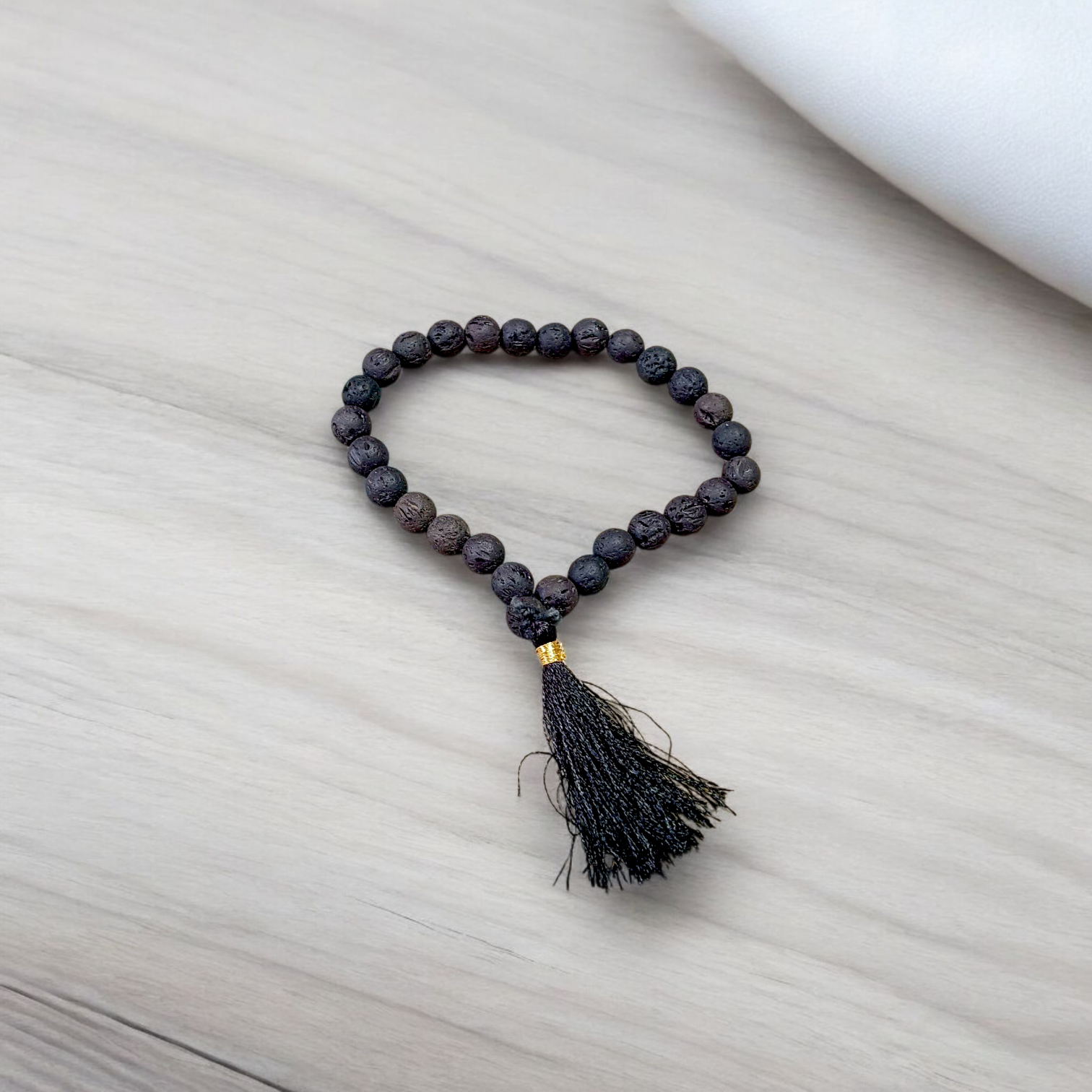 Original Lava Mala made of pure black lava beads for meditation and career stability – available in 27+1 and 108+1 bead variants