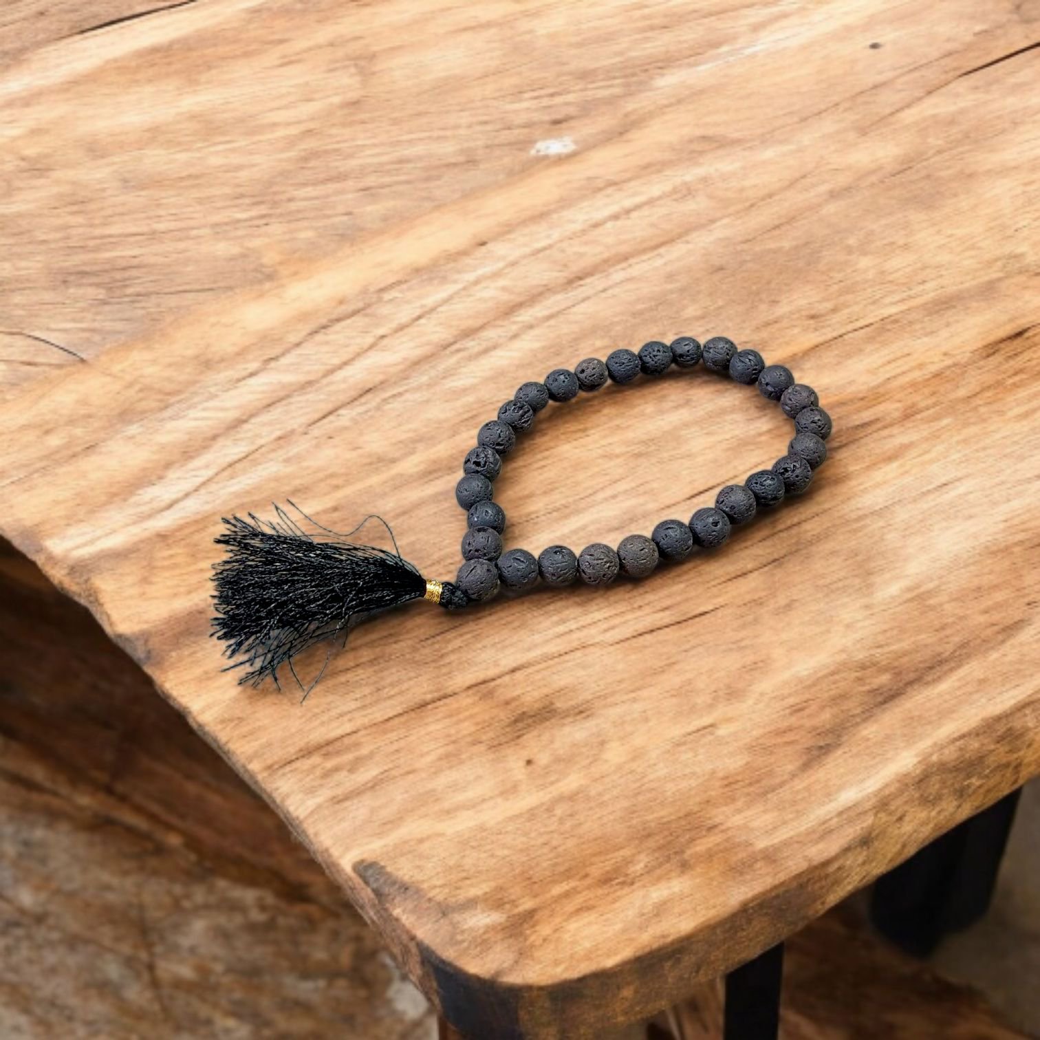 Original Lava Mala made of pure black lava beads for meditation and career stability – available in 27+1 and 108+1 bead variants