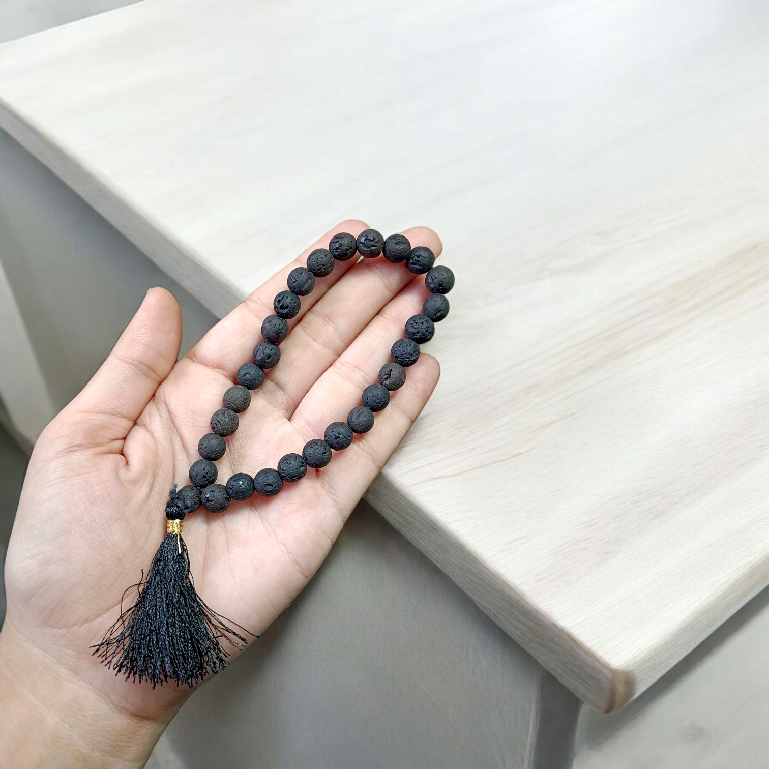 Original Lava Mala made of pure black lava beads for meditation and career stability – available in 27+1 and 108+1 bead variants
