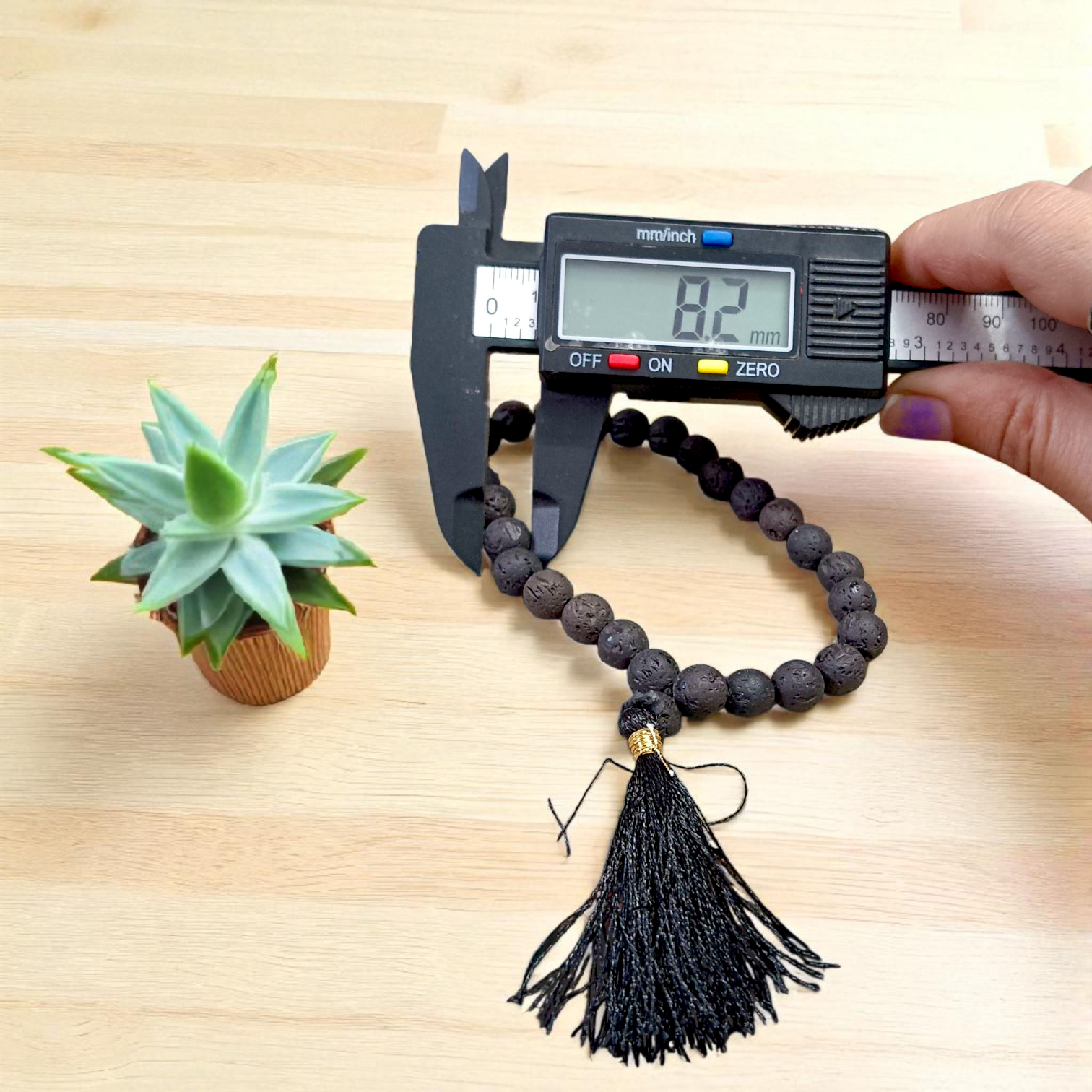 Original Lava Mala made of pure black lava beads for meditation and career stability – available in 27+1 and 108+1 bead variants