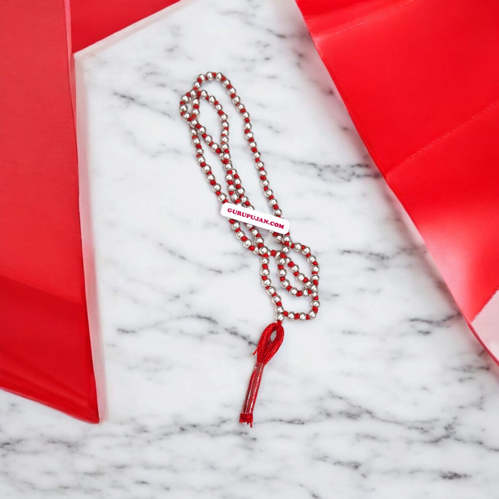 Original Parad Mala made with pure mercury beads, available in 27+1, 54+1, and 108+1 variants, offered by Gurupujan with lab certification and free gifts.