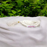 Original White Agate Mala with lab certification, available in 27+1, 54+1, and 108+1 beads, along with a stretchable bracelet, for meditation and spiritual growth.