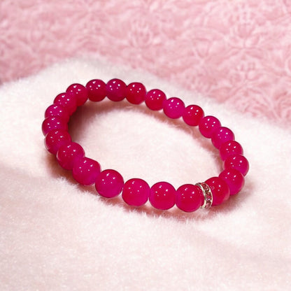 Pink Agate Bracelet with 8MM natural beads, lab certified, stretchable design, promoting emotional healing and harmony.