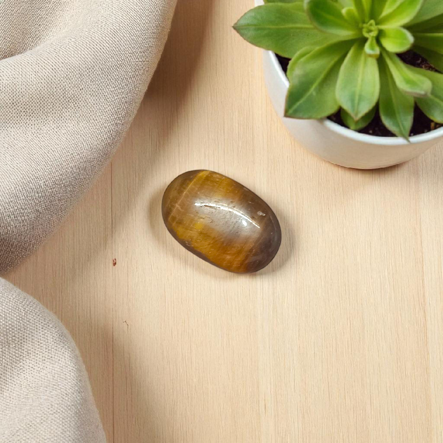 Polished Original Tiger Eye Stone&nbsp; with natural brown and golden bands, used for confidence, willpower, and meditation