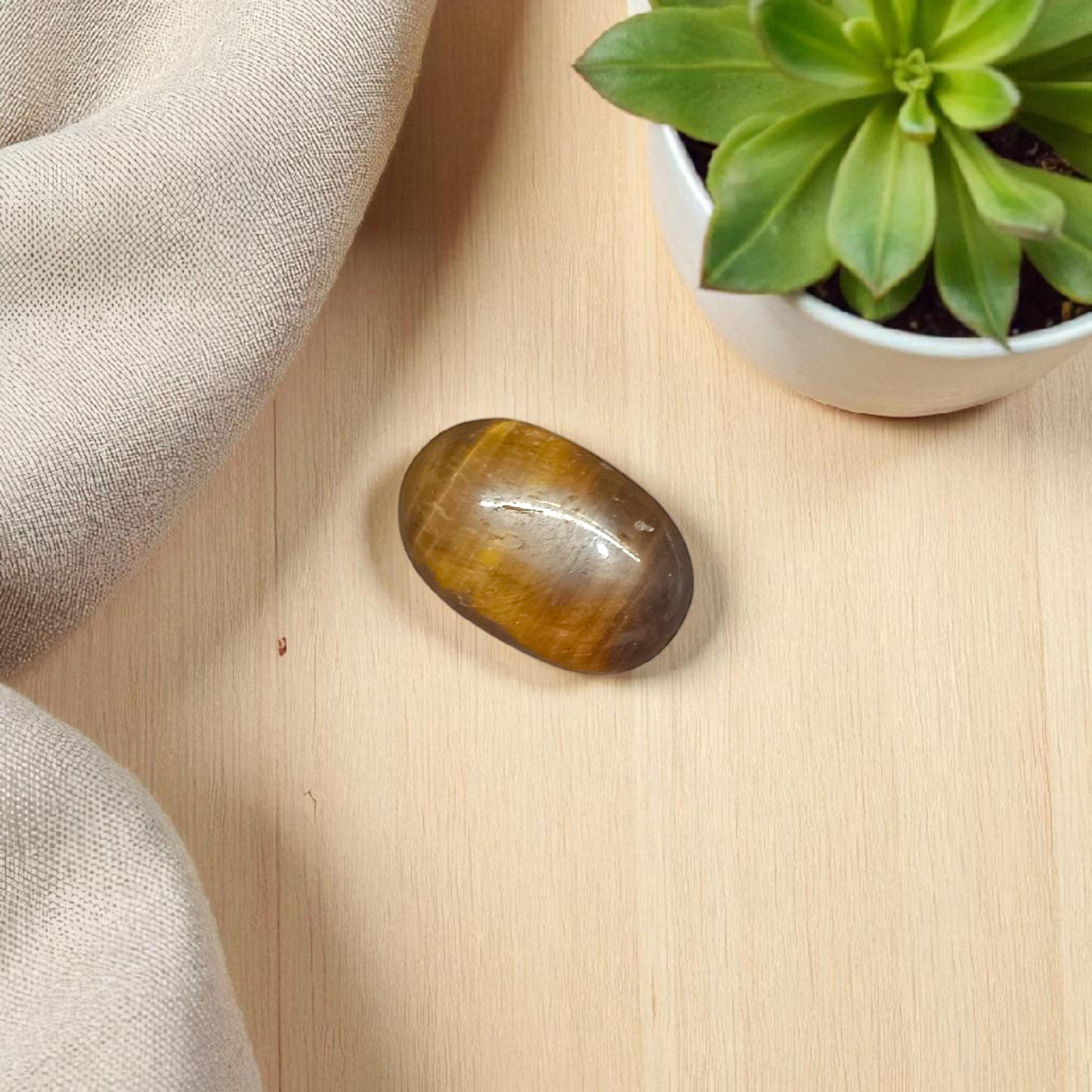 Polished Original Tiger Eye Stone&nbsp; with natural brown and golden bands, used for confidence, willpower, and meditation