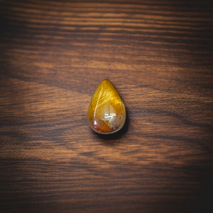 Polished Original Tiger Eye Stone&nbsp; with natural brown and golden bands, used for confidence, willpower, and meditation