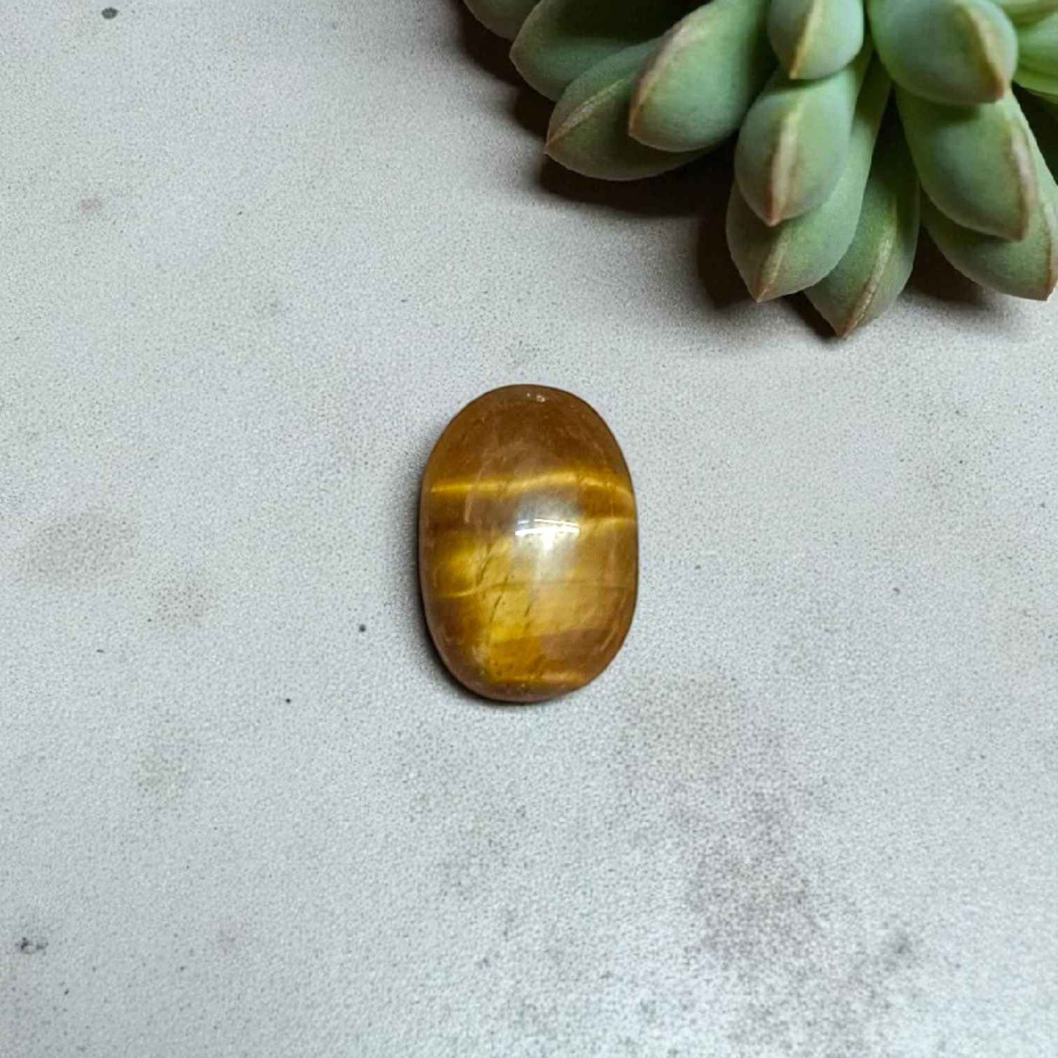Polished Original Tiger Eye Stone&nbsp; with natural brown and golden bands, used for confidence, willpower, and meditation