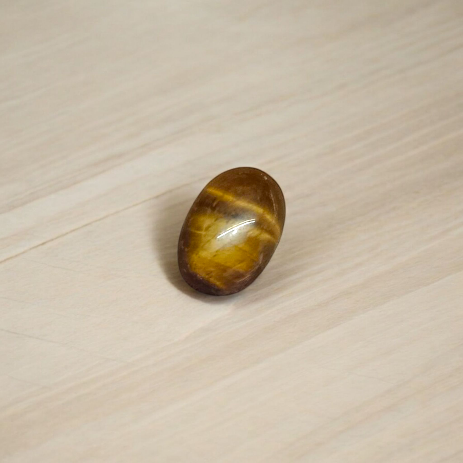 Polished Original Tiger Eye Stone&nbsp; with natural brown and golden bands, used for confidence, willpower, and meditation