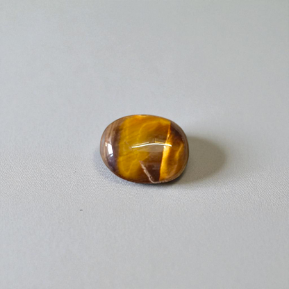 Polished Original Tiger Eye Stone&nbsp; with natural brown and golden bands, used for confidence, willpower, and meditation