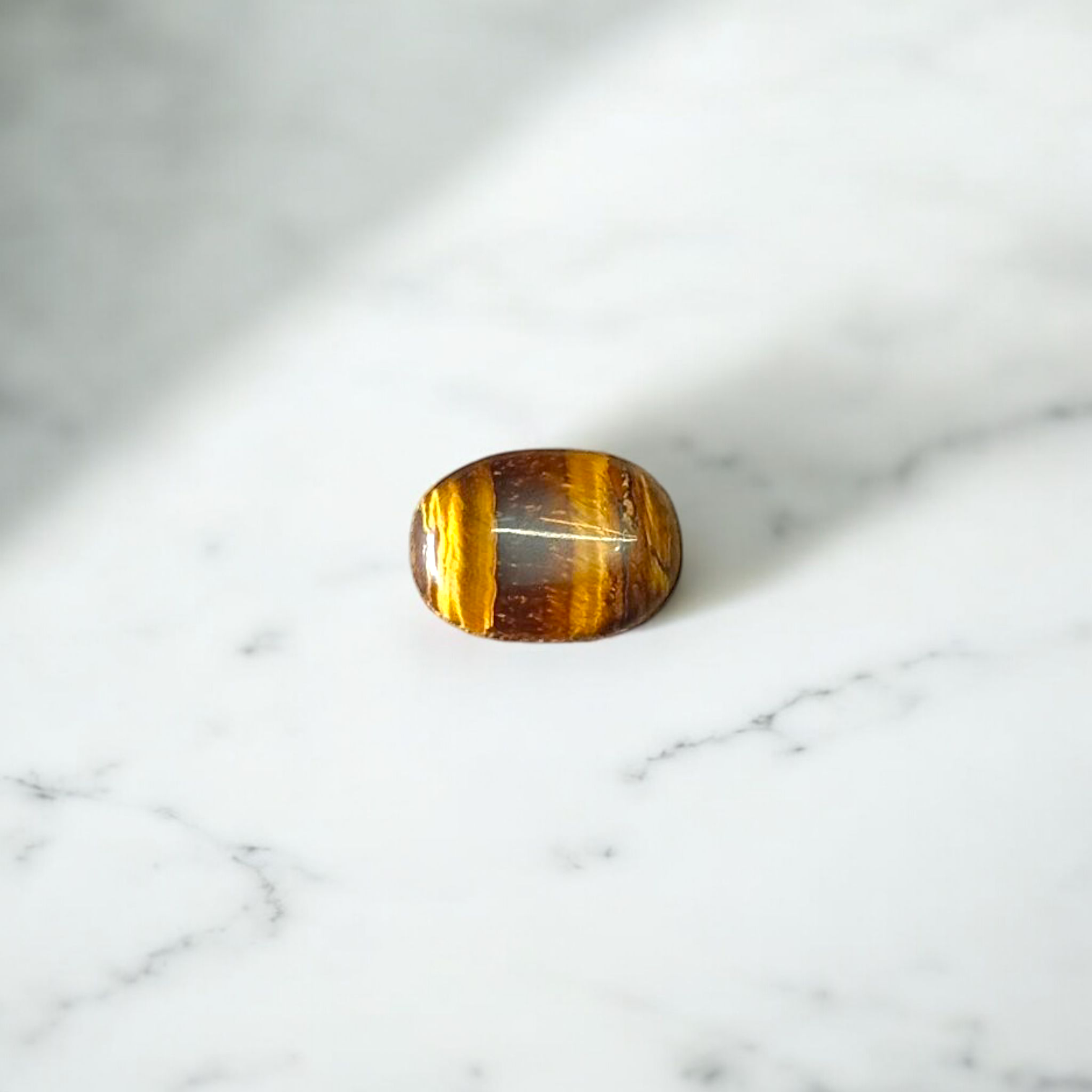 Polished Original Tiger Eye Stone&nbsp; with natural brown and golden bands, used for confidence, willpower, and meditation