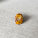 Polished Original Tiger Eye Stone&nbsp; with natural brown and golden bands, used for confidence, willpower, and meditation