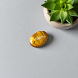 Polished Original Tiger Eye Stone&nbsp; with natural brown and golden bands, used for confidence, willpower, and meditation