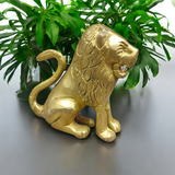 Pure Brass Lion Idol designed for table and temple decor, symbolizing strength, courage, and protection."