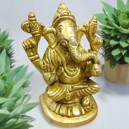 Pure brass statue of Lord Ganesha, intricately designed with details symbolizing wisdom, prosperity, and the removal of obstacles.