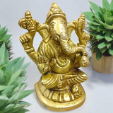 Pure brass statue of Lord Ganesha, intricately designed with details symbolizing wisdom, prosperity, and the removal of obstacles.