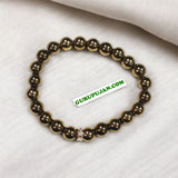 Pyrite Bracelet crafted with natural golden Pyrite beads, 8MM in size, stretchable design, certified for authenticity and confidence enhancement.