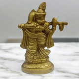Radha Krishna Brass Idol with intricate detailing, showcasing Lord Krishna playing the flute and Radha in a loving pose.