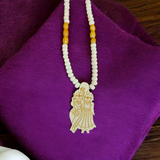 Radha Krishna Tulsi Mala with a pendant, featuring organic Tulsi beads and a pendant with Lord Krishna and Goddess Radha