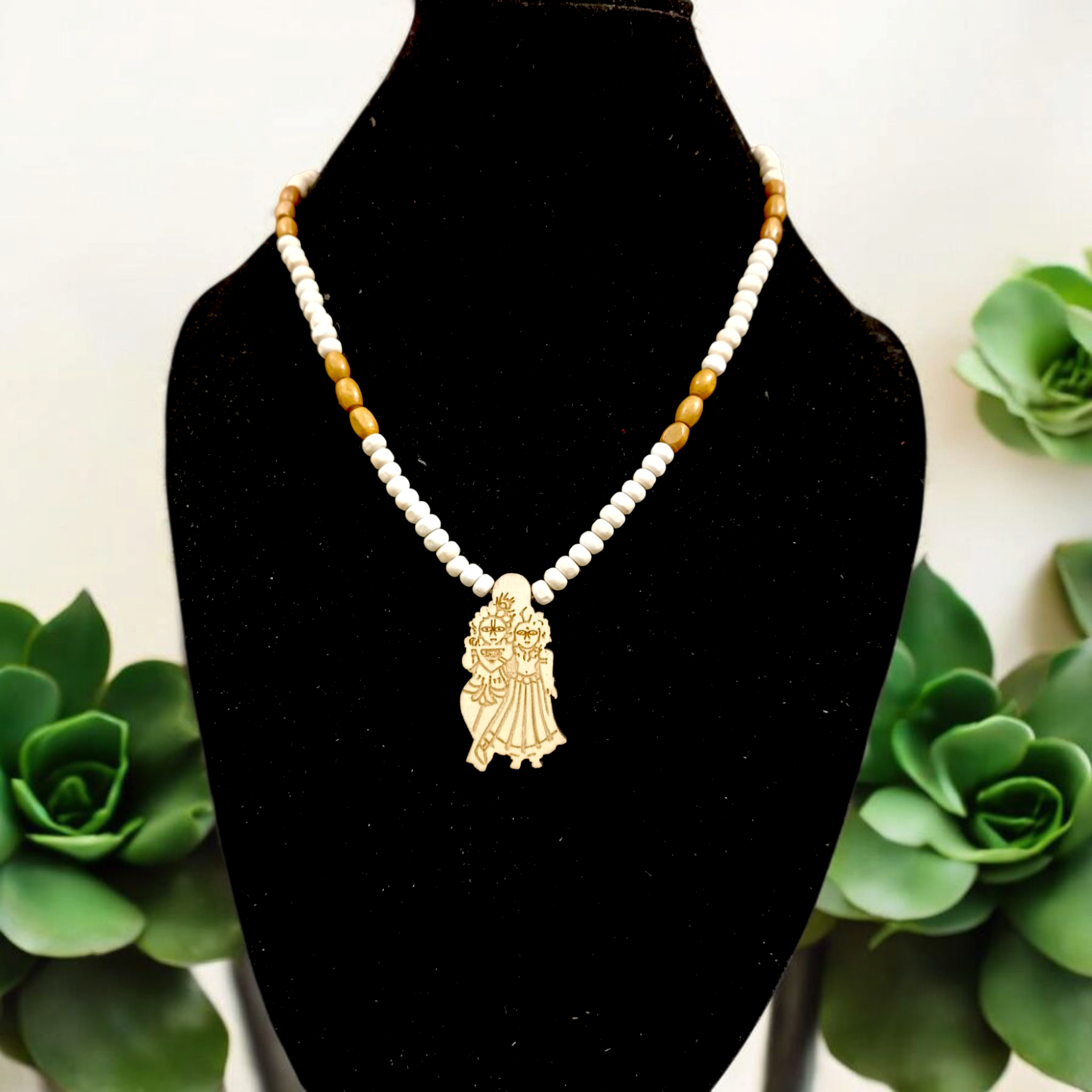 Radha Krishna Tulsi Mala with a pendant, featuring organic Tulsi beads and a pendant with Lord Krishna and Goddess Radha