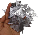 Ranga Ketu Yantra Coin (Sikka) used for astrological remedies, designed to counteract the negative effects of the Ketu planet and bring prosperity.