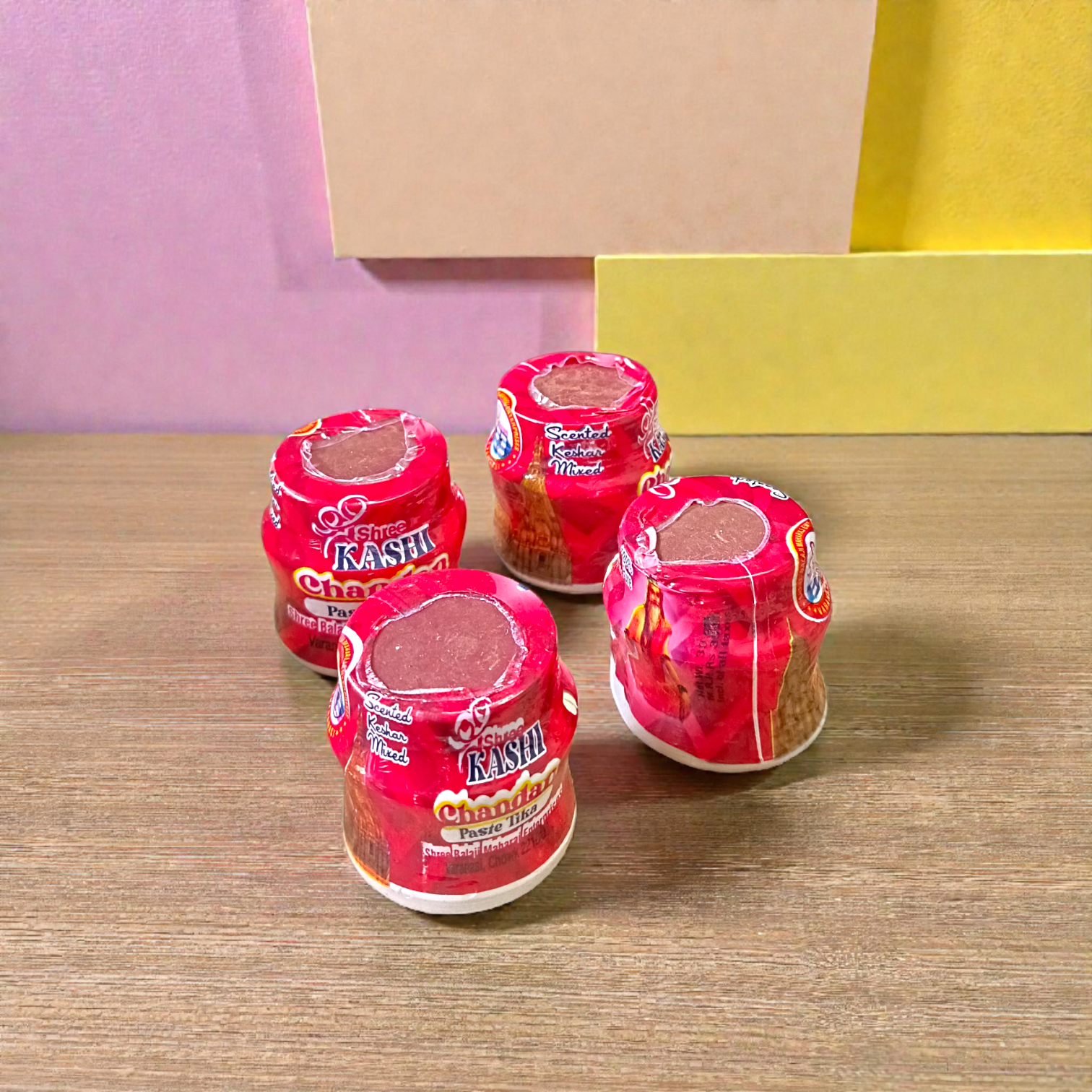 Red chandan paste tika container used for tilak and puja rituals