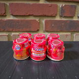 Red chandan paste tika container used for tilak and puja rituals