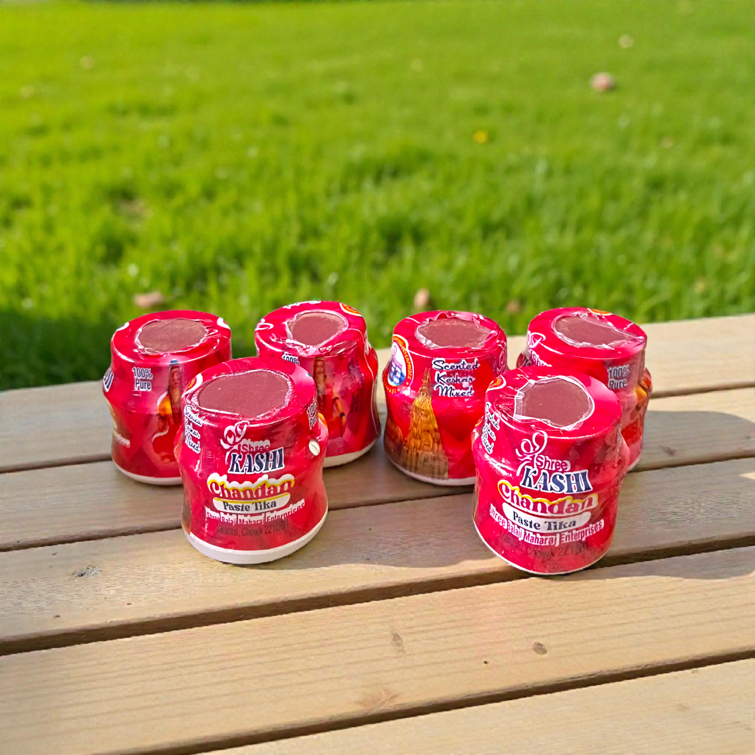 Red chandan paste tika container used for tilak and puja rituals