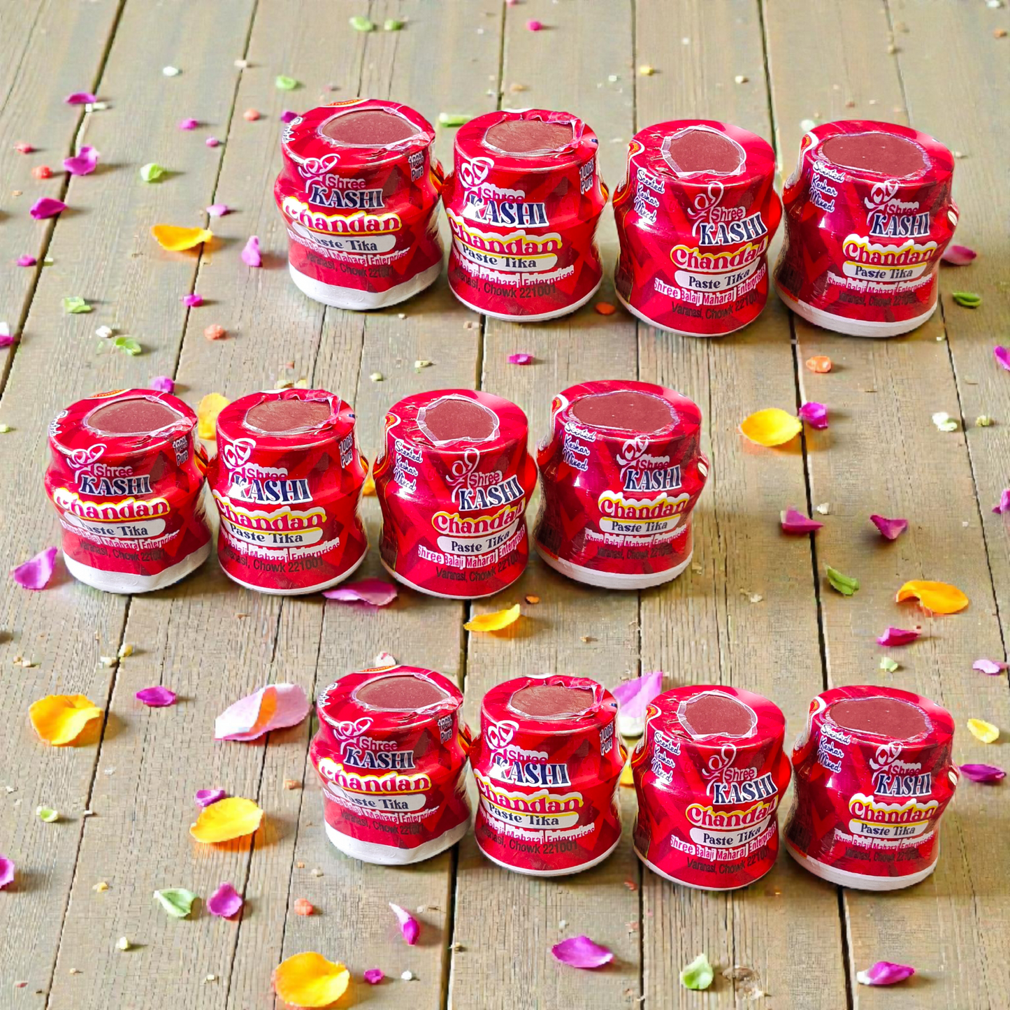 Red chandan paste tika container used for tilak and puja rituals