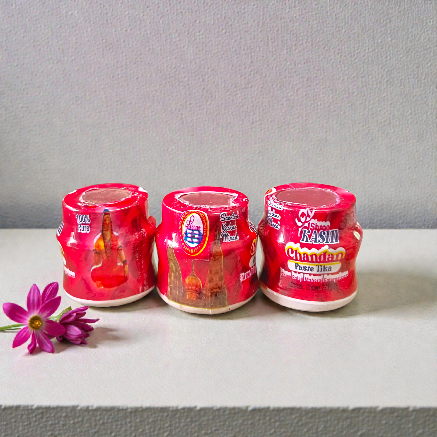 Red chandan paste tika container used for tilak and puja rituals