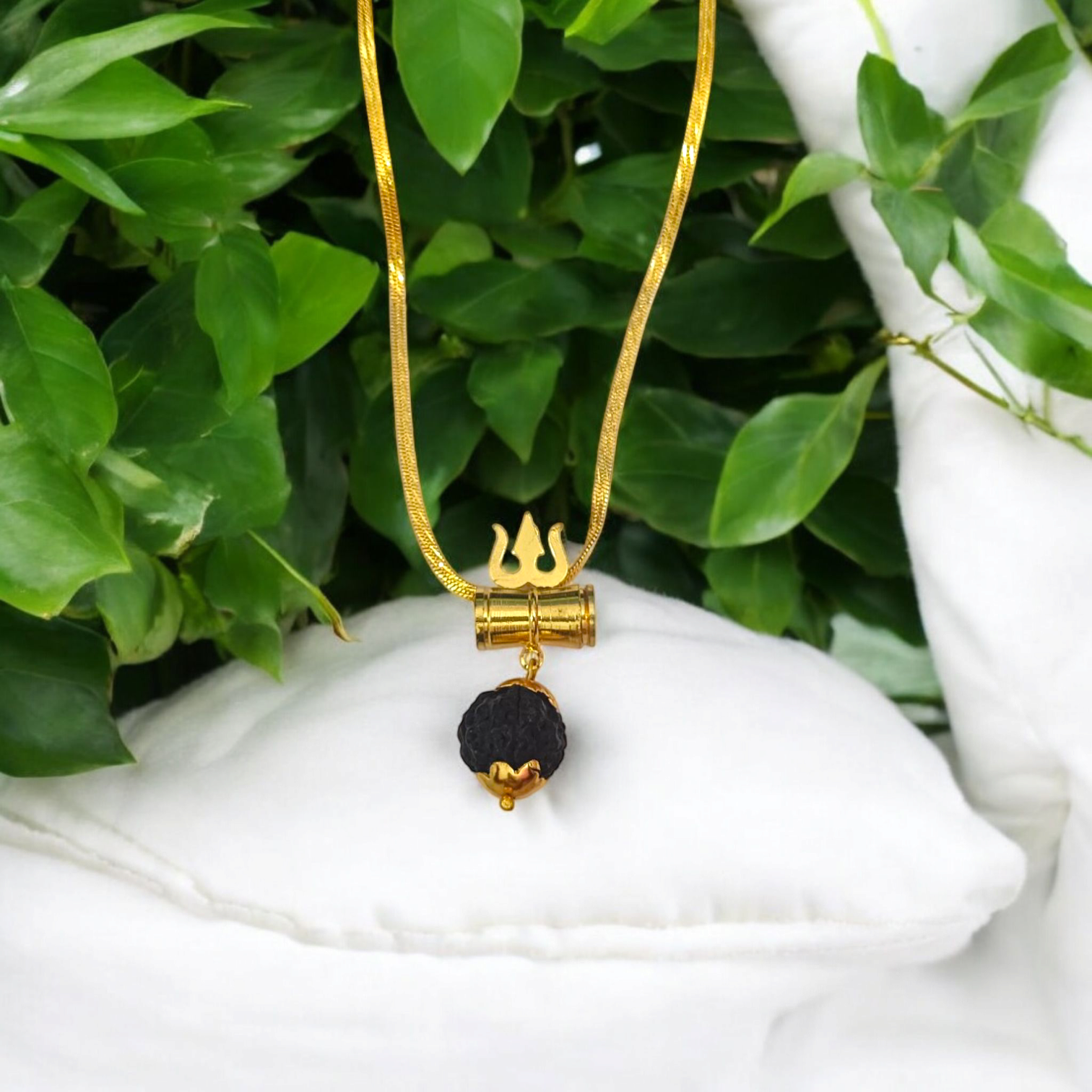 Rudraksha Locket with Brass Damru and Trishul Pendants, complemented by a free gold-plated chain, symbolizing Lord Shiva’s divine protection.