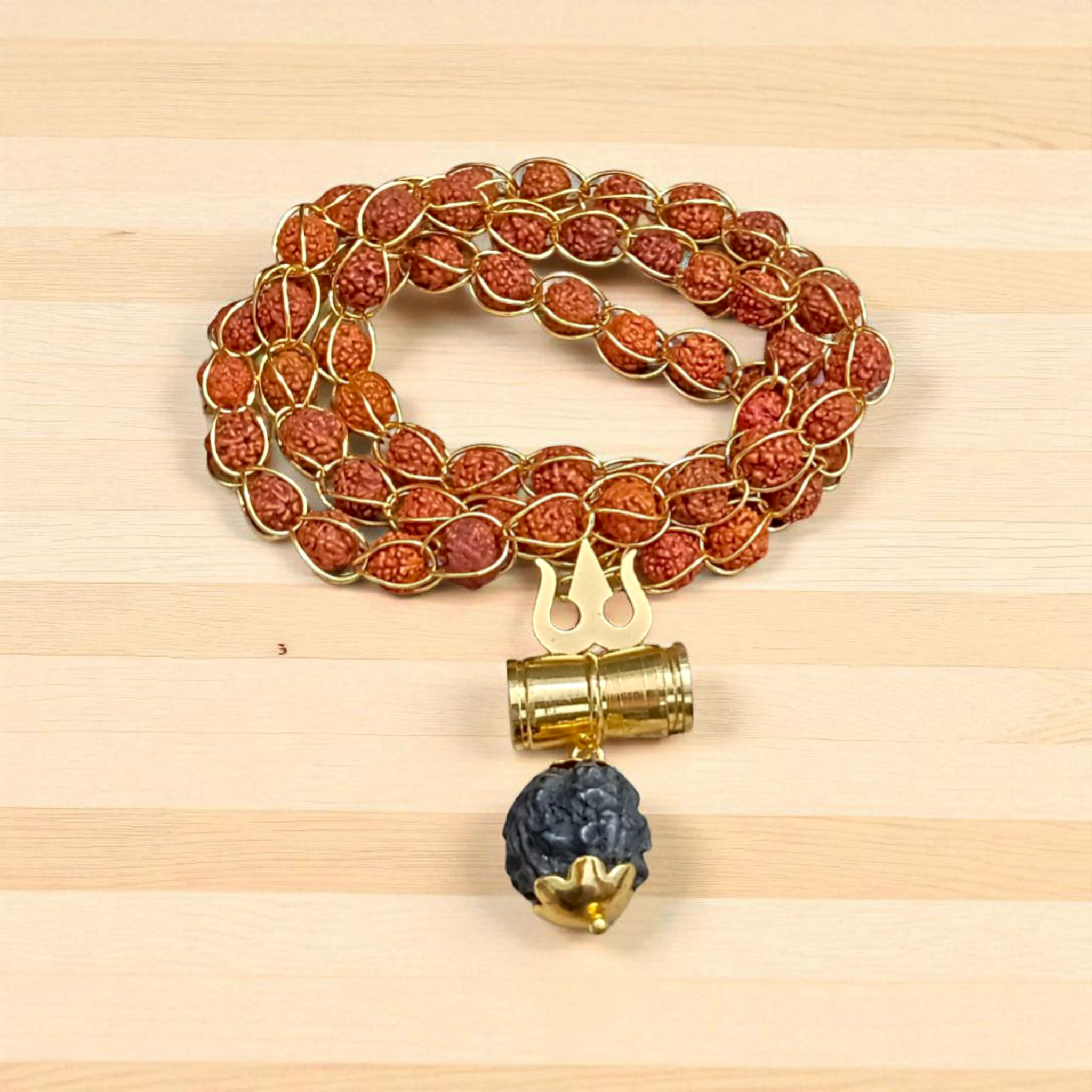 Rudraksha Mala with Gold Wired Design and Trishul Locket, offering divine protection and spiritual blessings from Lord Shiva