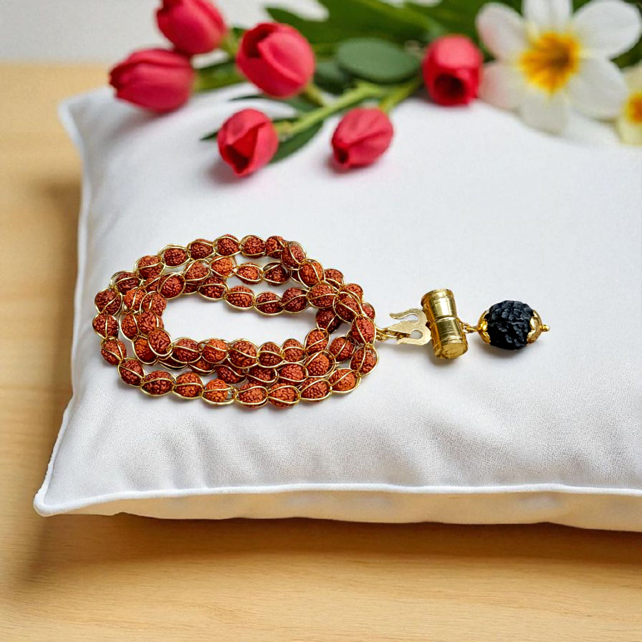 Rudraksha Mala with Gold Wired Design and Trishul Locket, offering divine protection and spiritual blessings from Lord Shiva