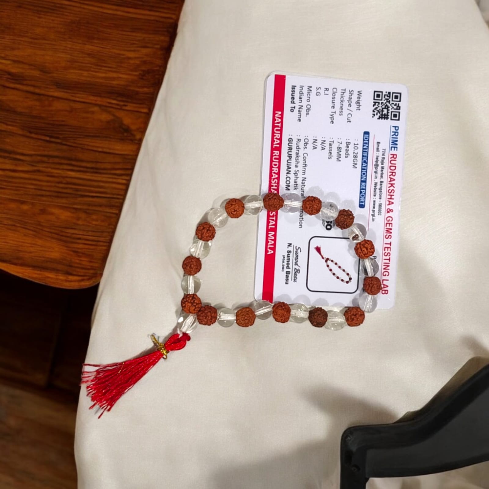 Rudraksha Sphatik Mala 27+1 beads made from natural Rudraksha and crystal, designed to clear negativity and bring happiness.