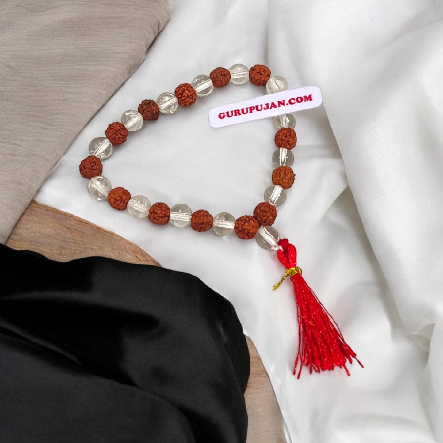 Rudraksha Sphatik Mala 27+1 beads made from natural Rudraksha and crystal, designed to clear negativity and bring happiness.