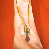 Rudraksha Trishul Locket with Navratna Gemstones, featuring a divine protection symbol and a gold chain for daily wear and spiritual growth.
