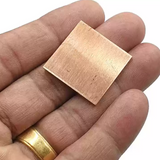 Set of 11 Copper Square Pieces (Copper Patra) used for Vastu correction, spiritual rituals, and energy enhancement.