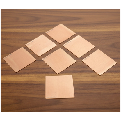 Set of 11 Copper Square Pieces (Copper Patra) used for Vastu correction, spiritual rituals, and energy enhancement.